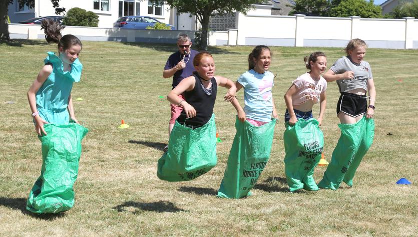 Girls sack race at Kingsfurze Ave Sports Day