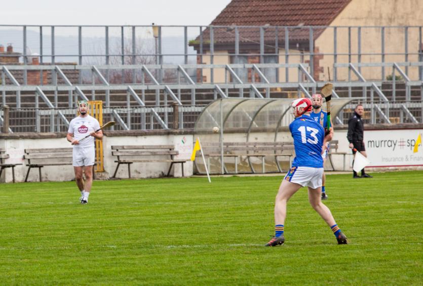 Seanie Germaine of Wicklow score's a free