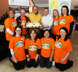 General Manager Gerry Russell and Staff holding a cake celebrating the Westgrove Hotels 10th year in business Michelle McLoughlin, William O Reilly, General Manager Gerry Russell, Head Chef John Carolan, Alisha Callaghan, Maja Epps, Catherine Killeen, Vivienne Franco, Danitza Clarke and Helen O Donnell