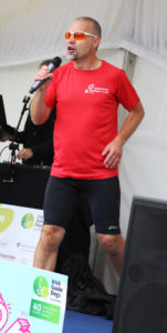 Brendan Loughlin from Brendans Running Club warms up the crowd