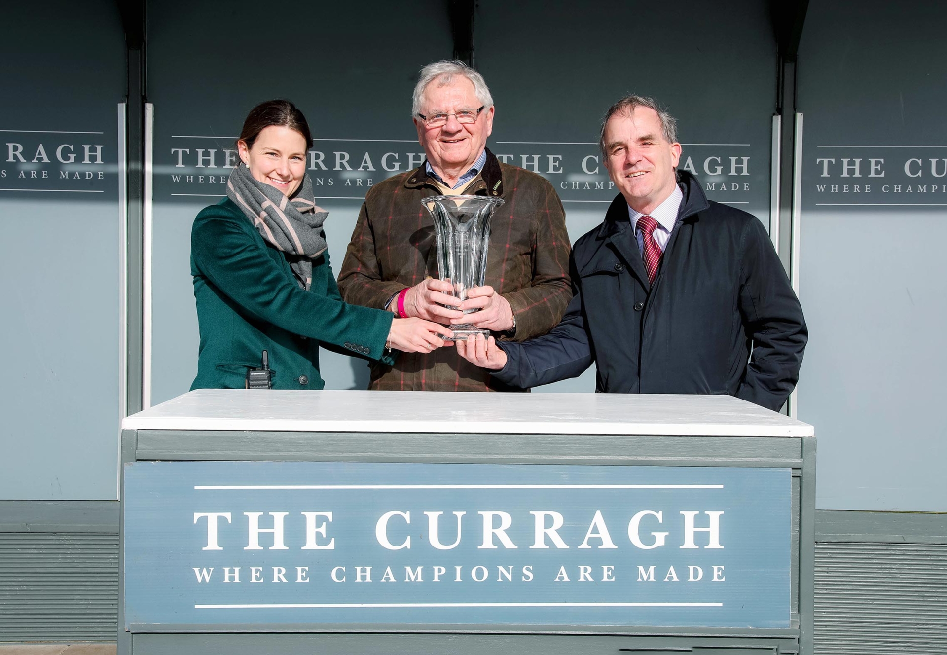 Tara Buick (Curragh Racecourse) pictured with Brendan Boylan and John Osborne who are both members of Eadestown GAA. Brendan and John won the top €7,000 prize when their horse called “LATTAM” won the big Paddy Power Irish Lincolnshire race
