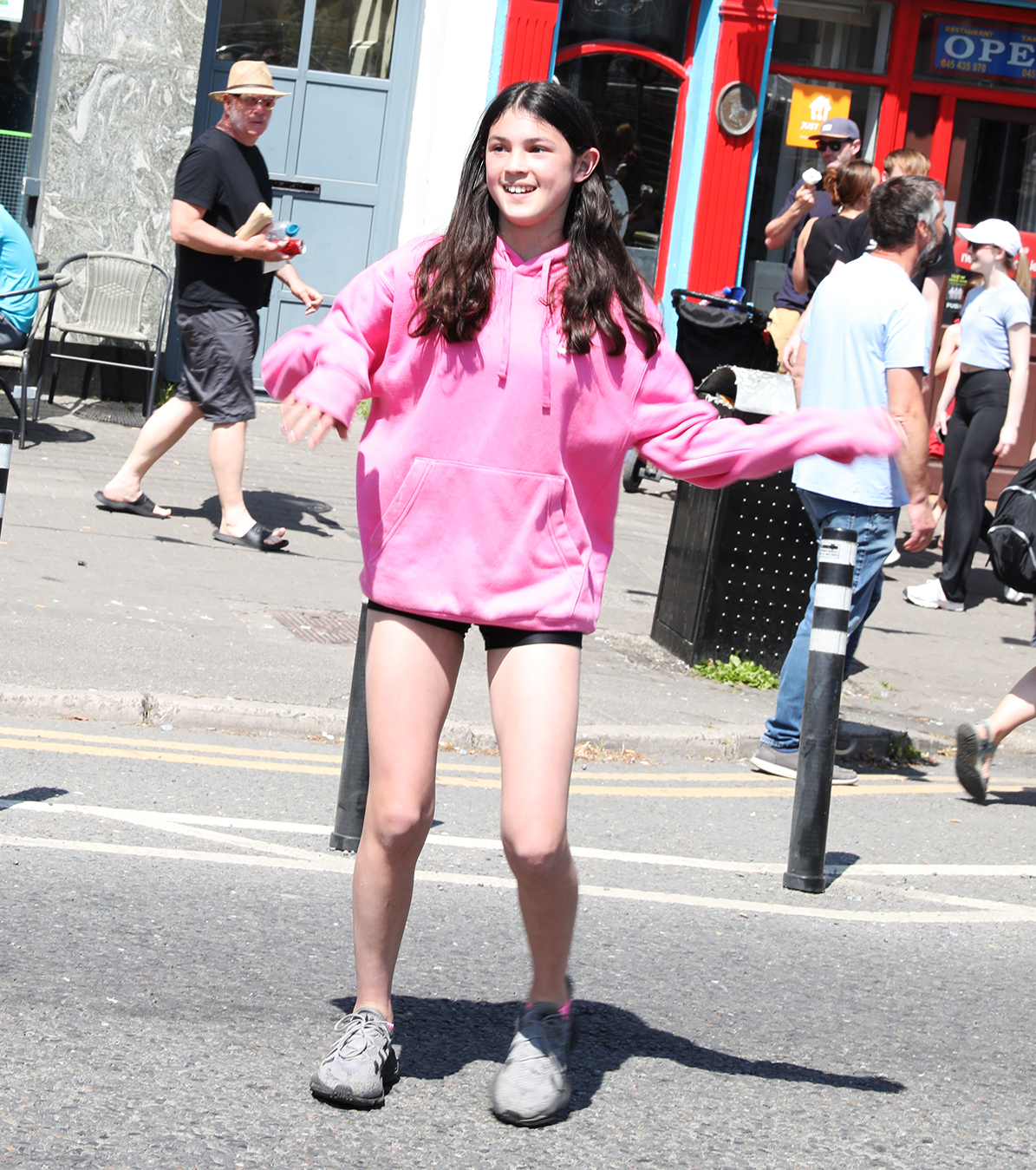  Carmen Conway from the Filipino Kildare Community dances on the main street in Newbridge