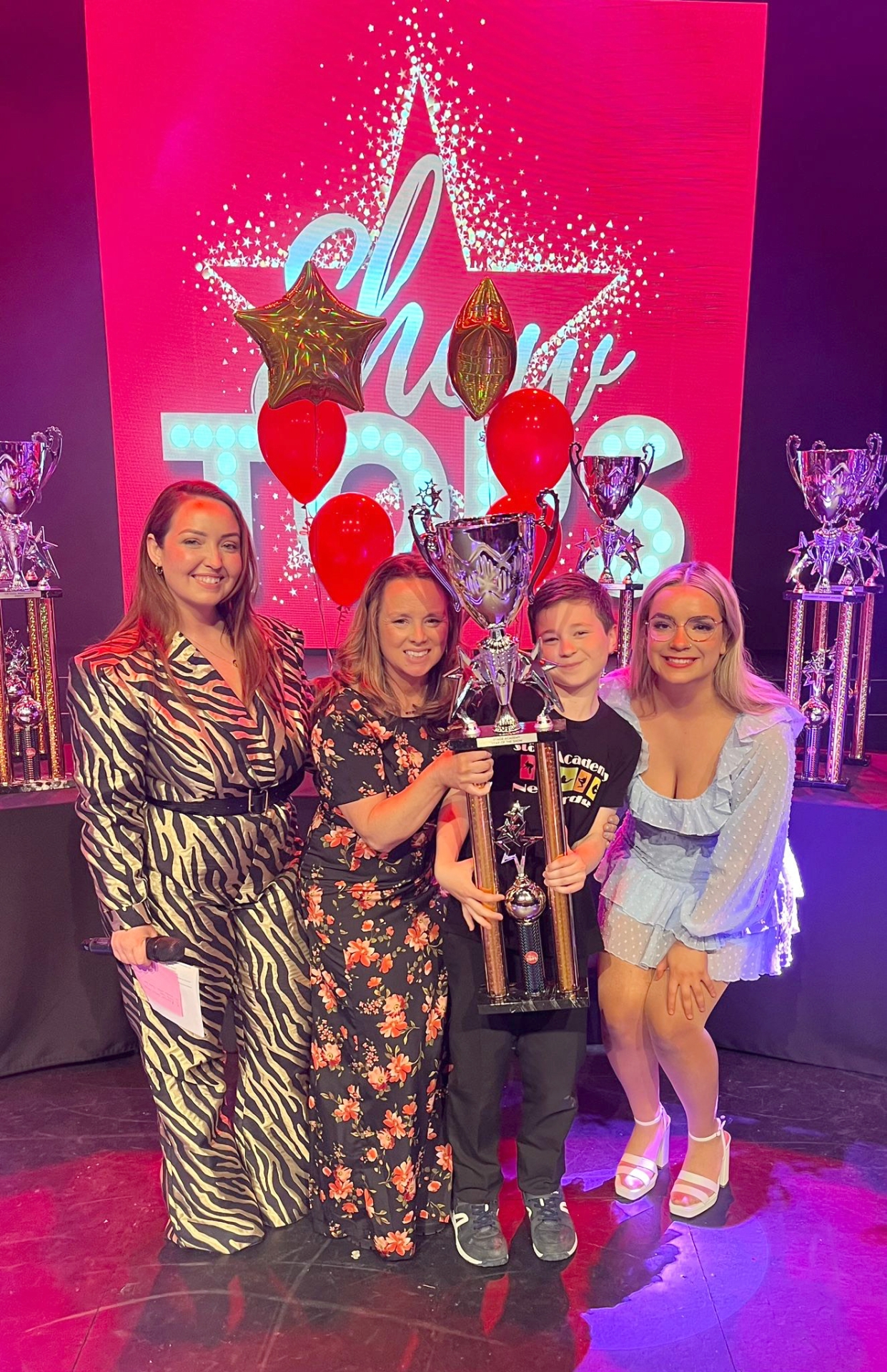 Kim Shortall (Director of ShowTops), Brenda Malone Gilroy (Director of Stage Academy) and Tayna Gallagher (Stage Academy Drama Teacher) presents Ben Sheppard with the Star of the show award